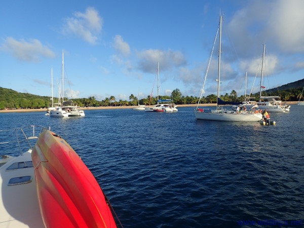 Saline Bay at Mayreau, the Grenadines, with kayak and catamaran
